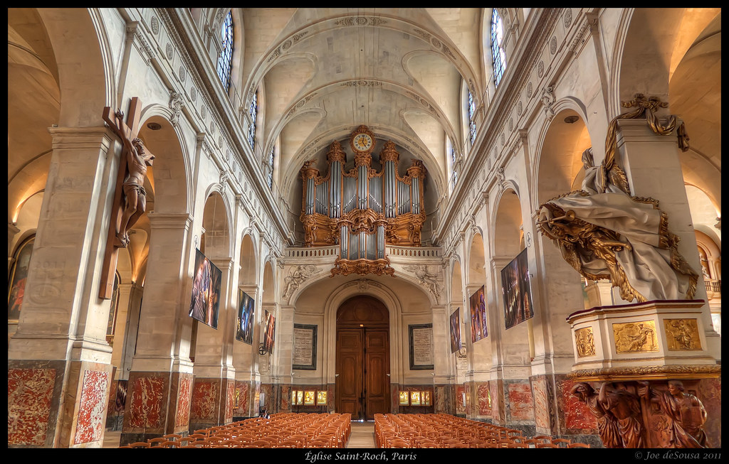 Historic church nave with a baroque pipe organ above the west door